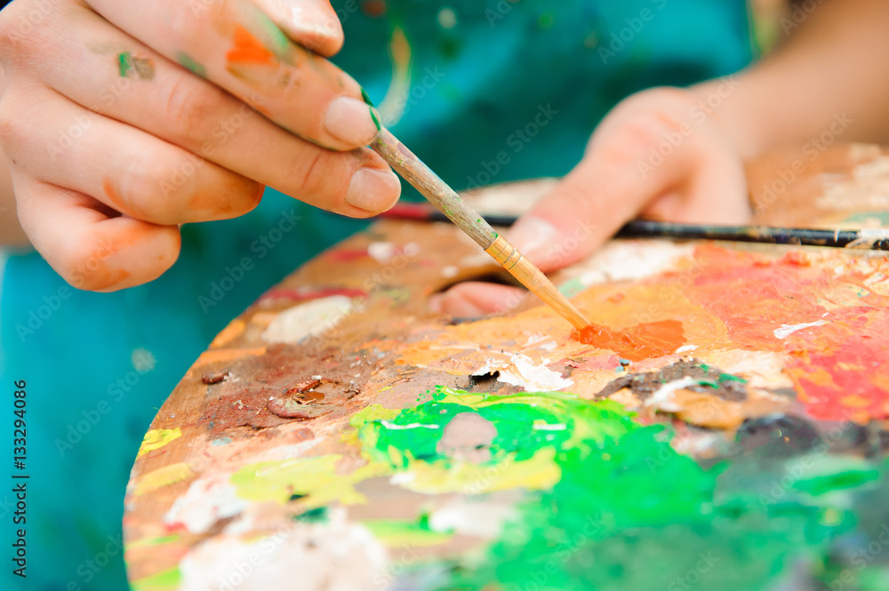 beautiful young girl draws a picture paints on art lesson beautiful young girl draws a picture paints on art lesson