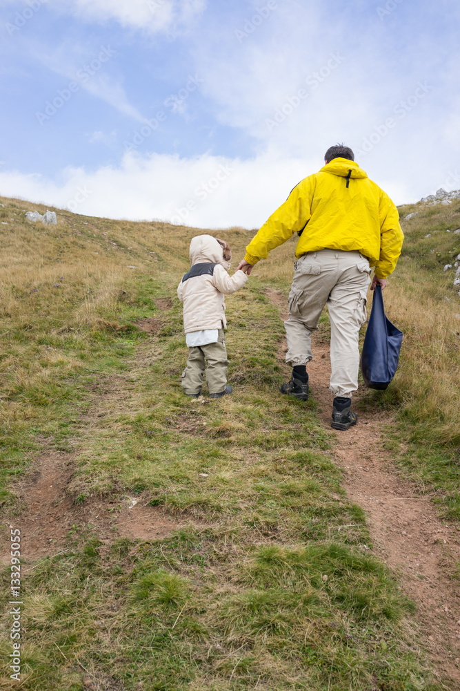 Son with father on mountain