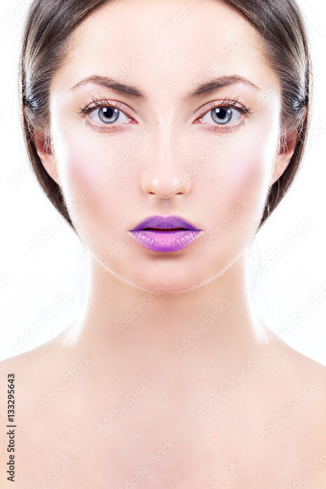 Portrait of a beautiful young woman. Face close-up Portrait of a beautiful young woman. Face close-up