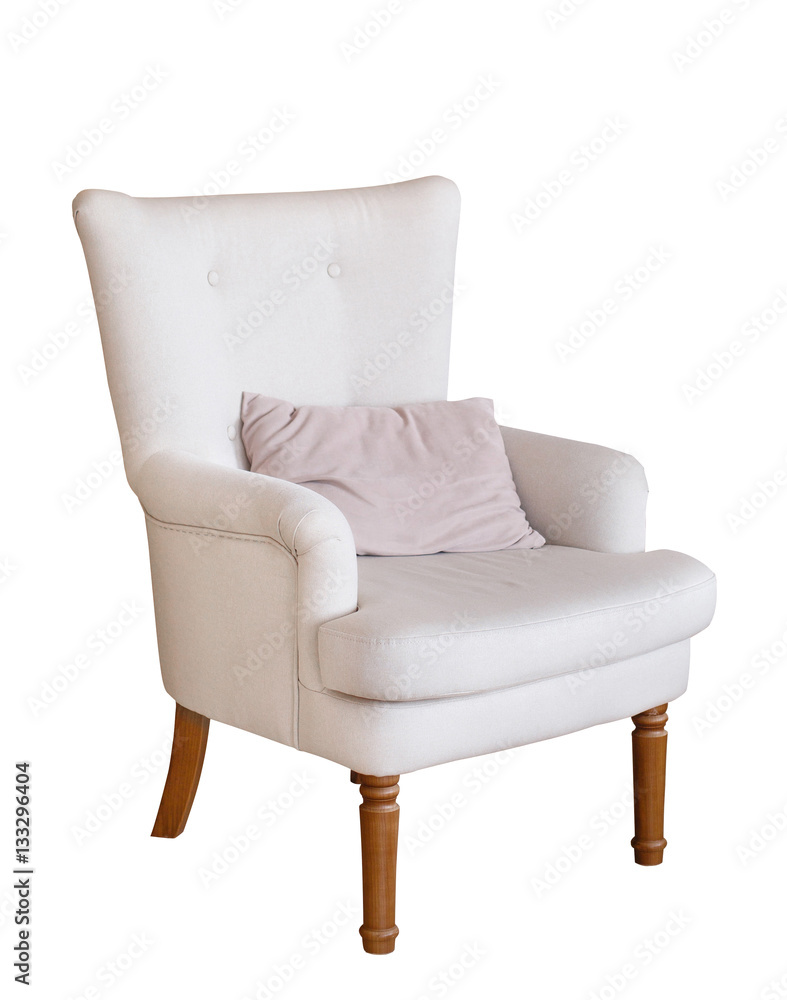 Fototapeta premium soft armchair with a pillow isolated on white. Armchair with fabric upholstery