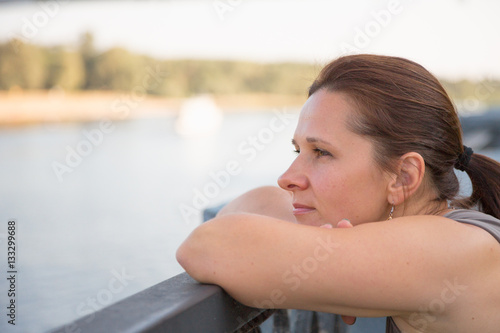 girl on a pier in the summer. close-up portrait
