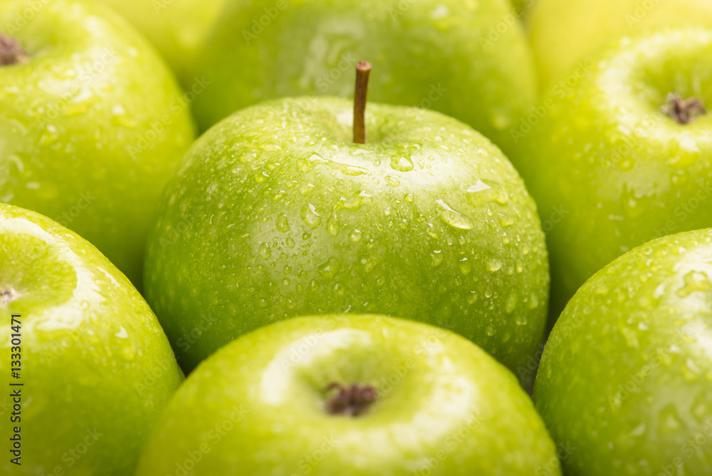 Green fresh apples close up, selective focus. Green fresh apples close up, selective focus.