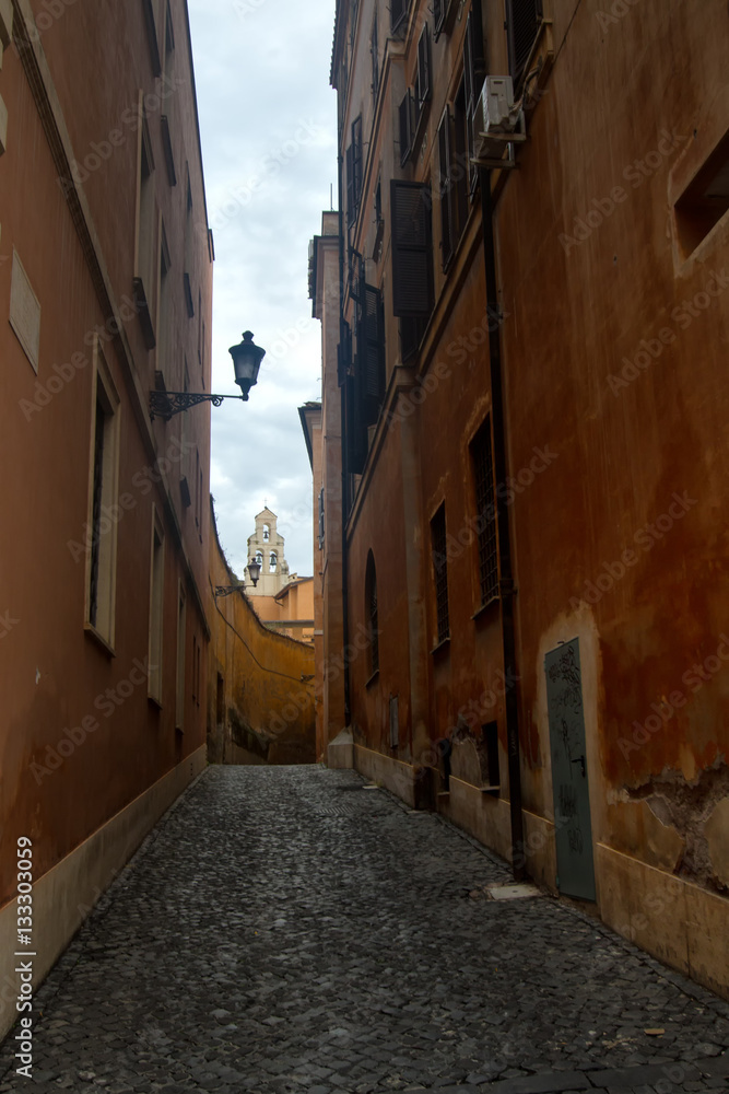 rome street with bell tower