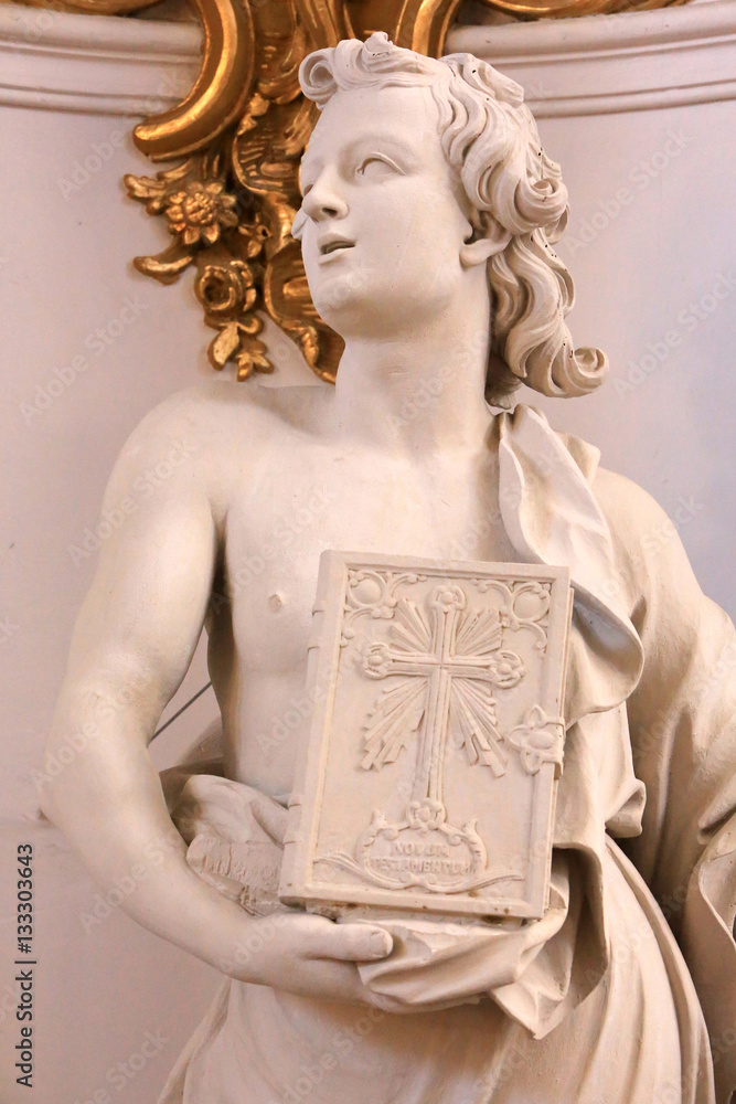 Naklejka premium Ange tanant une Bible. Eglise Saint-Bruno-les-Chartreux. Lyon. / Angel holding a Bible. St. Bruno's church. Lyon..