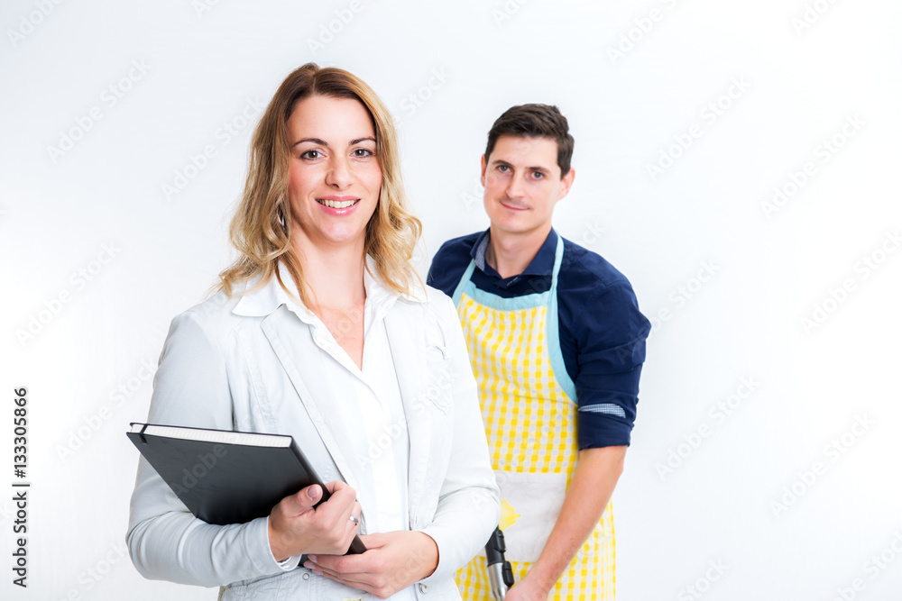 young blond businesswoman and her husband with child in backgrou young blond businesswoman and her husband with child in backgrou