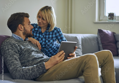 Couple looking at tablet