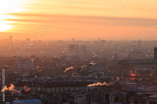 Aerial view of beautiful city of Paris from Montmartre at sunset, France 