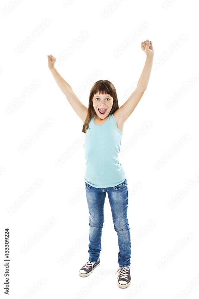 Portrait of a beautiful and confident girl with arms on the air. Isolated on white background. Excited little girl celebrates Portrait of a beautiful and confident girl with arms on the air. Isolated on white background. Excited little girl celebrates