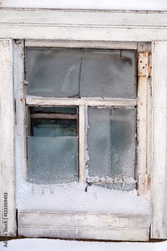 Old wooden vintage frozen window