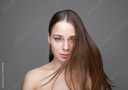 Beautiful brunette woman with long hair