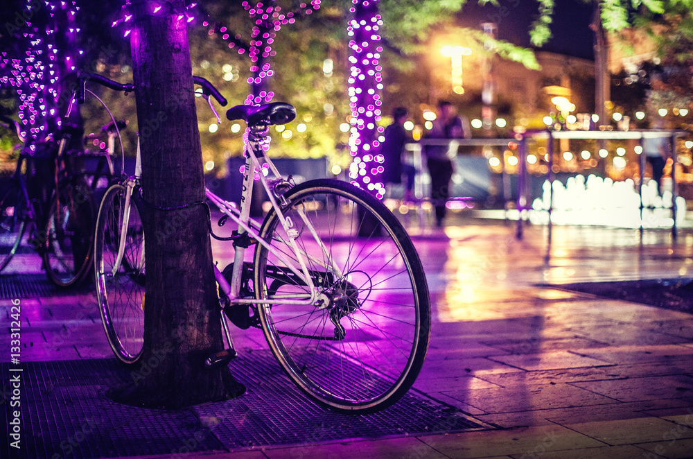 Pink bicycle with bokeh