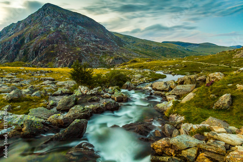 Pen yr Ole Wen and mountain stream in Snowdonia National Park Wales. the seventh highest mountain in Snowdonia and in Wales. It is the most southerly of the Carneddau range.