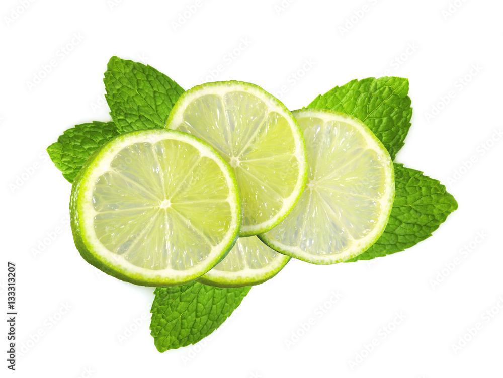 fresh slices lime with leaf mint isolated on white fresh slices lime with leaf mint isolated on white