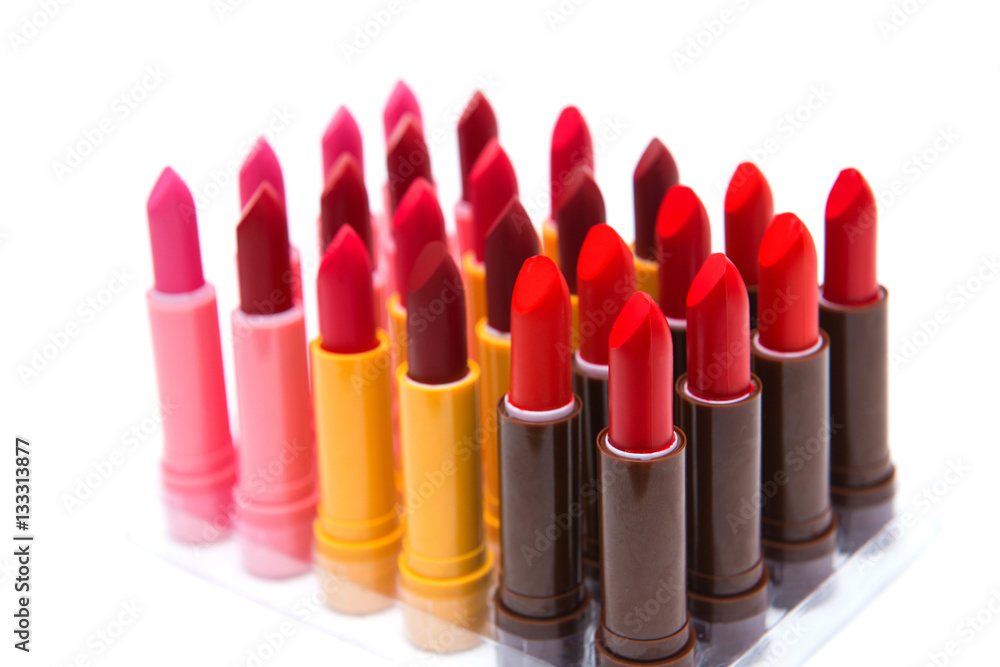 Obraz premium set of lipsticks red color on white background