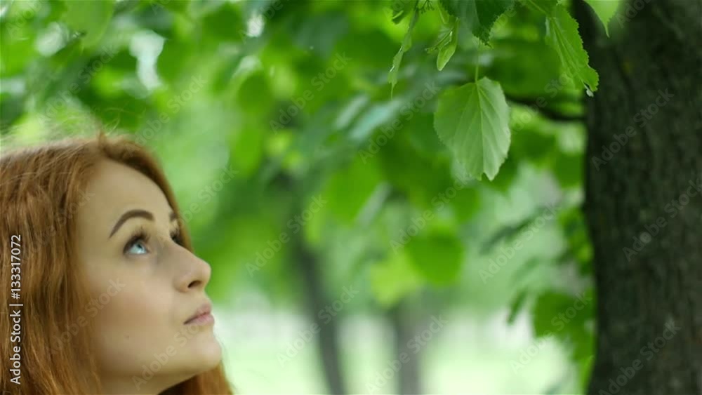 Attractive girl with beautiful curly hair enjoying nature Attractive girl with beautiful curly hair enjoying nature