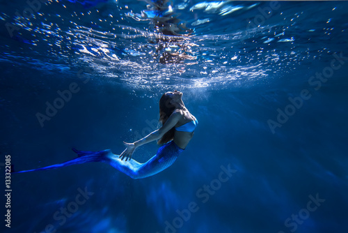 Freediver girl with the mermaid tale