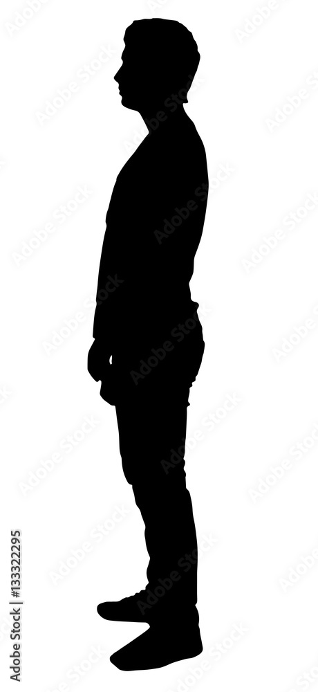 Silhouette of a man who stands sideways