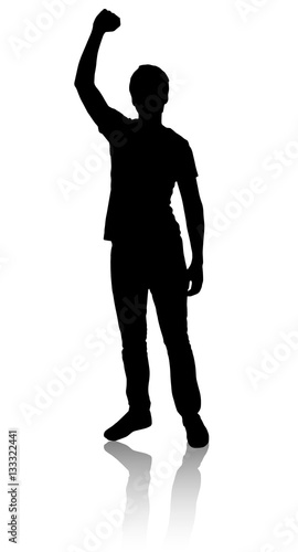 Silhouette of a man who raised his hand to celebrate the victory.