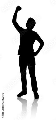 Silhouette of a man who raised his hand