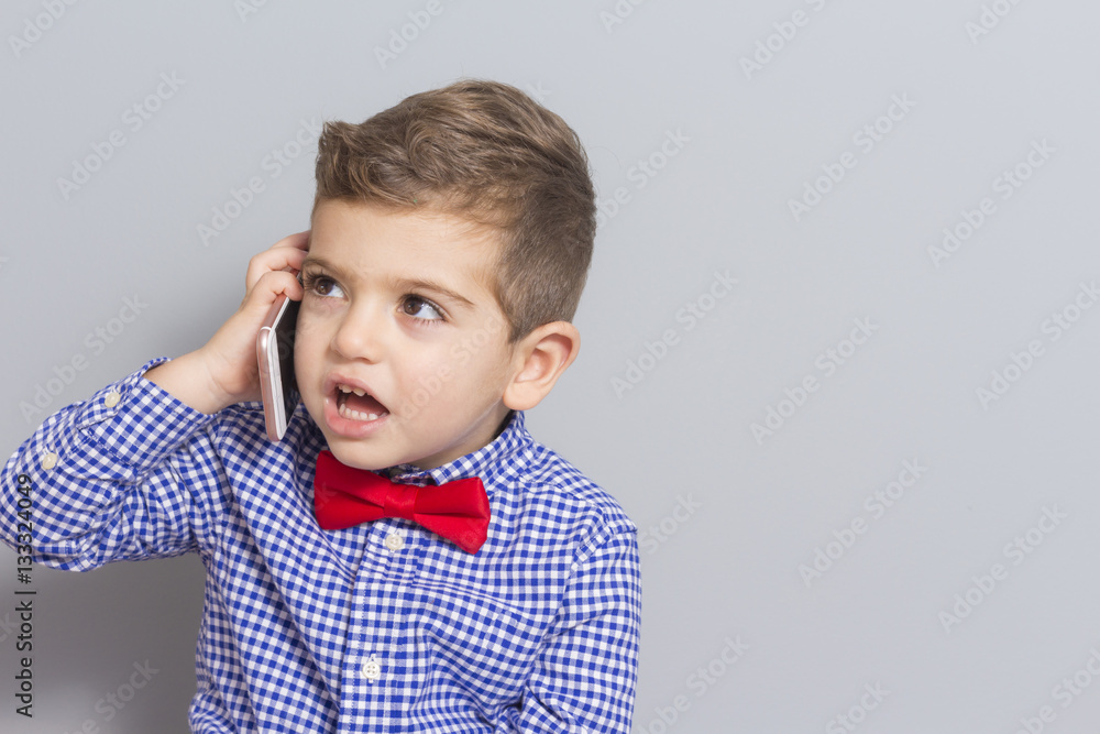 Little boy talking on the phone Little boy talking on the phone