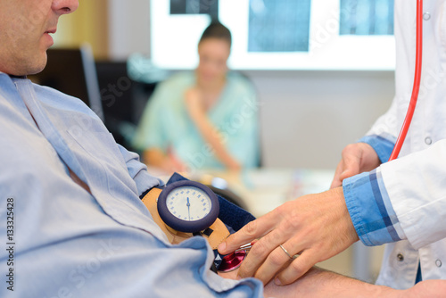 taking blood pressure