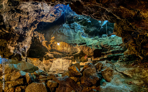 Beautiful view of cave wall in cave passage, showing detail of the rock texture, illuminated by lamp,  Captured from Lawa cave, Purbalingga, Indonesia.