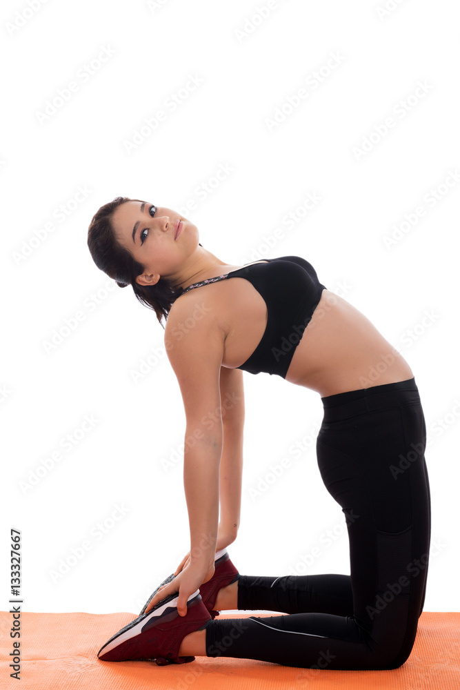 Sport girl doing yoga isolated on white background Sport girl doing yoga isolated on white background