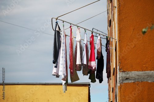 Laundered clothes drying outside  © nastyakamysheva