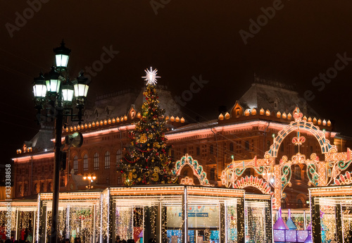 Decorations with Christmas tree and fair to New Year celebration at the Manege Square, Moscow, Russia