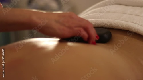 Wallpaper Mural Back coverd with hot stones as part of massage treatment Torontodigital.ca