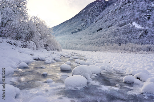 Flowing river at winter