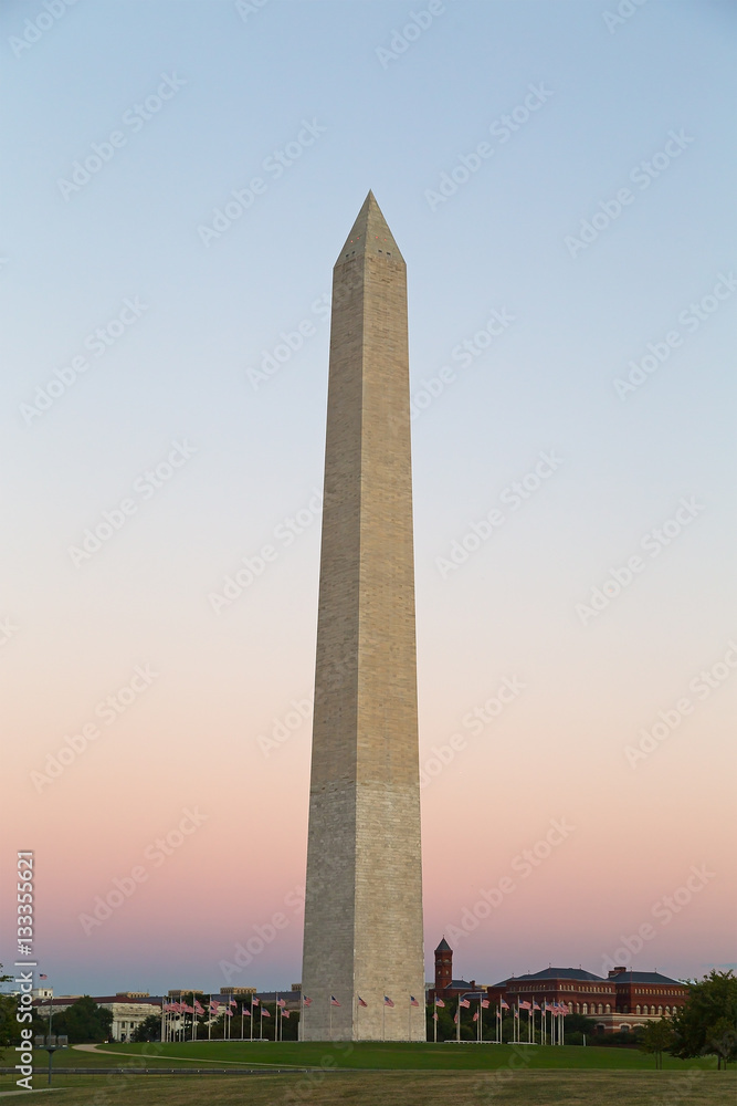 Washington Monument in the National Mall, Washington DC. Washington Monument on blue and pink sky background in the dusk.
