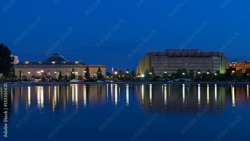 United States Botanic Garden in Washington, DC. Night view of the US Botanic Garden across the Capitol Reflecting Pool with beautiful reflections.