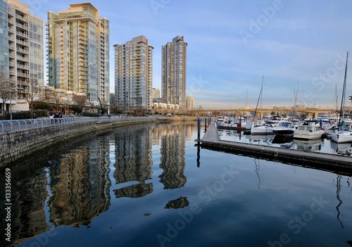 Seawall and boats in city marina. Yaletown. Cambie Bridge. False Creek.  Vancouver downtown. British Columbia. Canada.