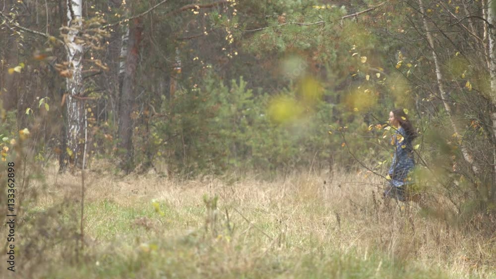 Walk in the autumn forest.
Happy pretty girl is walking in the forest. Focus out. Slow motion. Walk in the autumn forest.
Happy pretty girl is walking in the forest. Focus out. Slow motion.