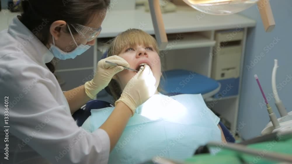 Patient at a reception at the dentist Patient at a reception at the dentist