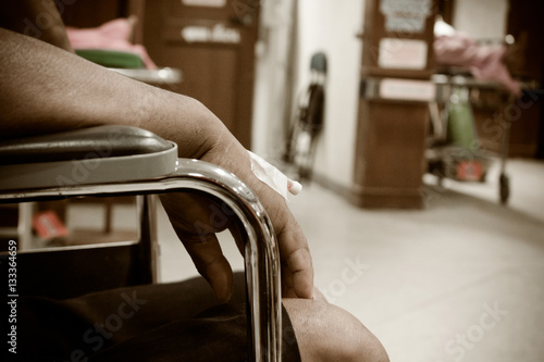 patient sitting on wheelchair in hospital vintage tone © napatcha