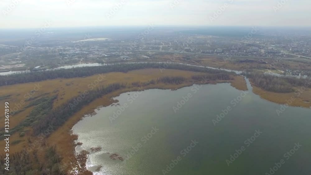 aerial view of the lake and the city on a sunny day aerial view of the lake and the city on a sunny day