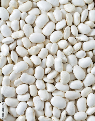 white butter beans on wooden surface