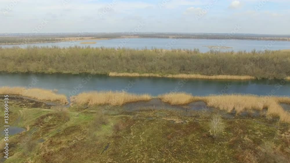 low flight over the marsh and lake low flight over the marsh and lake