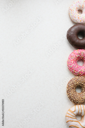 colored donuts on a light background