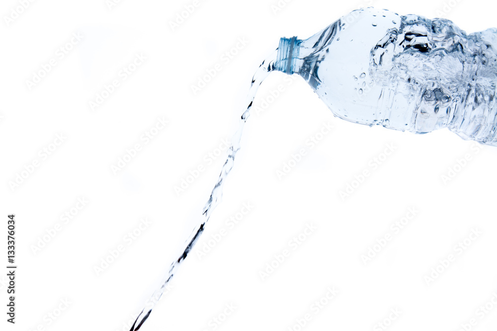 water splash out of a bottle on white background, with copy spac water splash out of a bottle on white background, with copy spac
