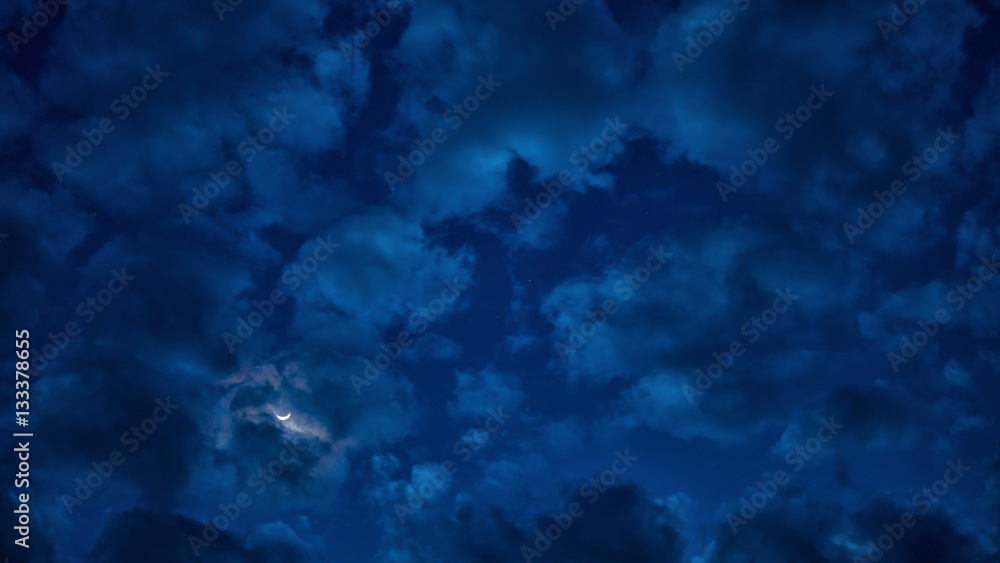 Cloudy and moon in the night sky.