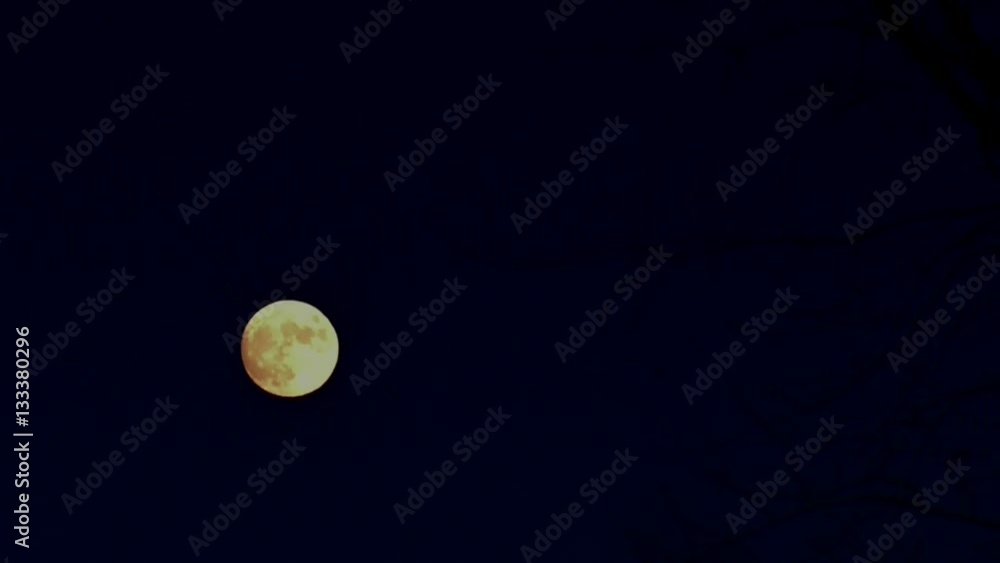 Full Moon rising motion in the sky. Mystical view on star. Astronomical survey of planets in real time. Astrotheme planet with craters and seas uninhabited land in Universe. Full Moon rising motion in the sky. Mystical view on star. Astronomical survey of planets in real time. Astrotheme planet with craters and seas uninhabited land in Universe.