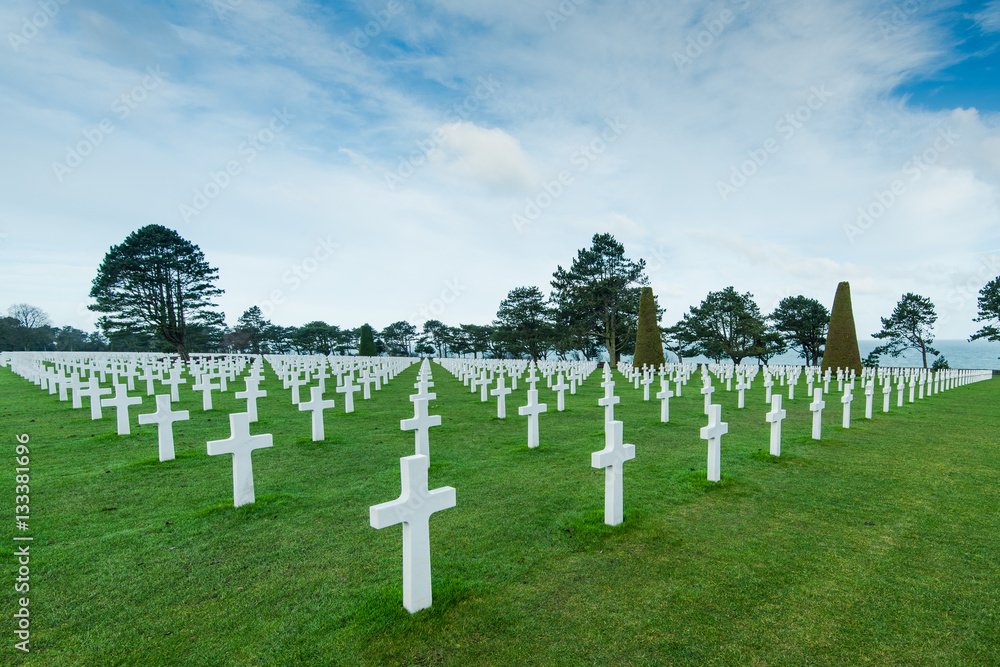 White marble cross on American Cemetery in Normandy