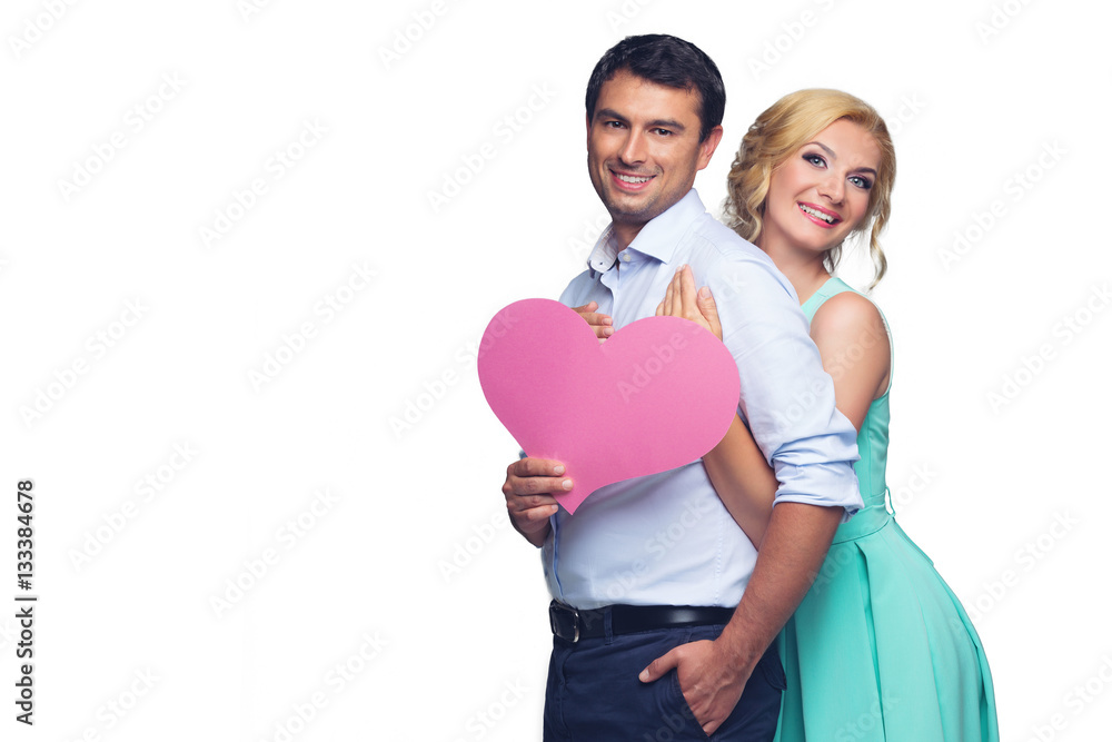 Beautiful couple holding pink heart