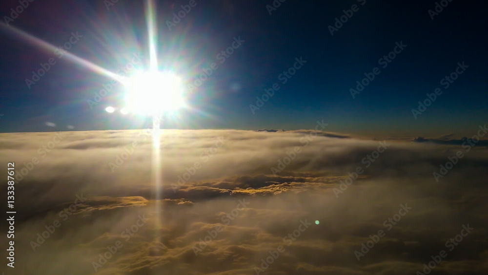 The sunrise from the window of the airplane