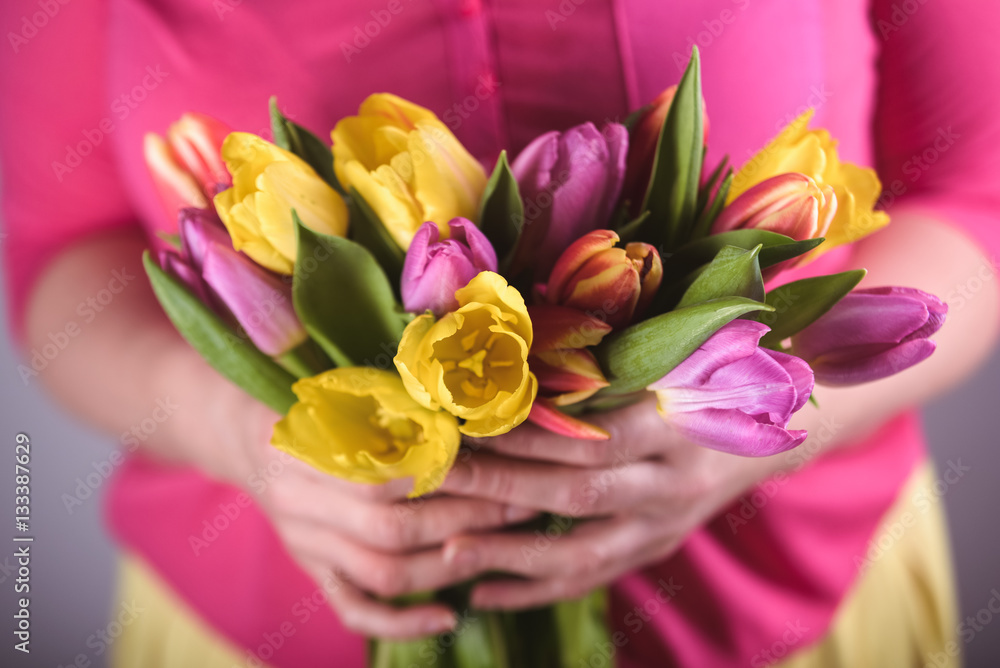 Woman with tulips in spring day Woman with tulips in spring day