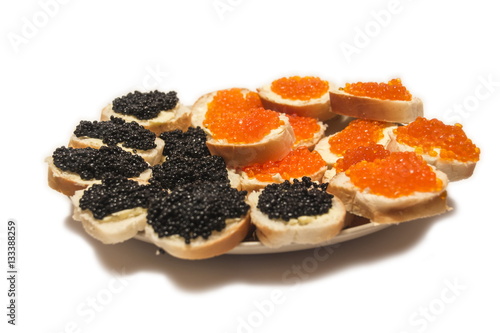 Group of snacks with red and black caviar