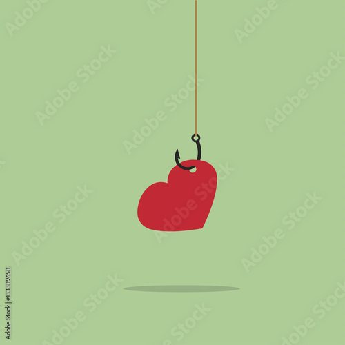 red heart symbol on fishing hook. Idea - Love and relationships,